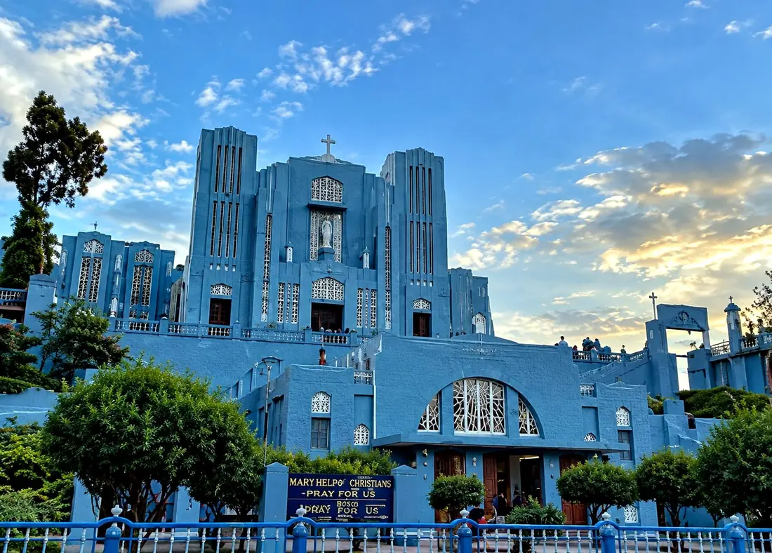 The blue Art Deco facade of Mary Help of Christians Church near Laitumkhrah, Shillong